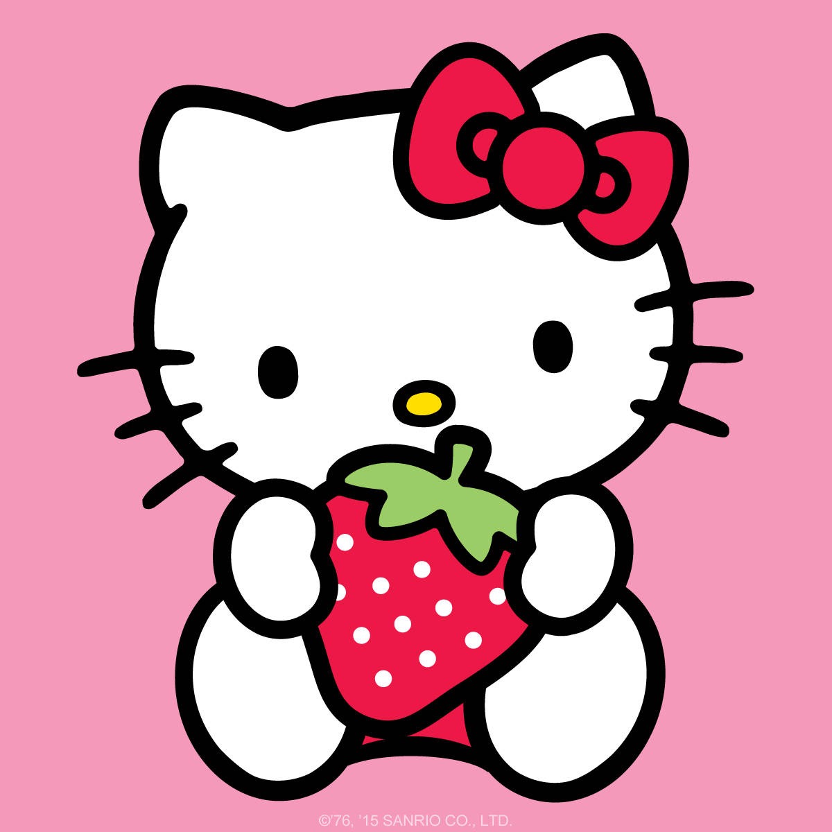 A cat holding a strawberry